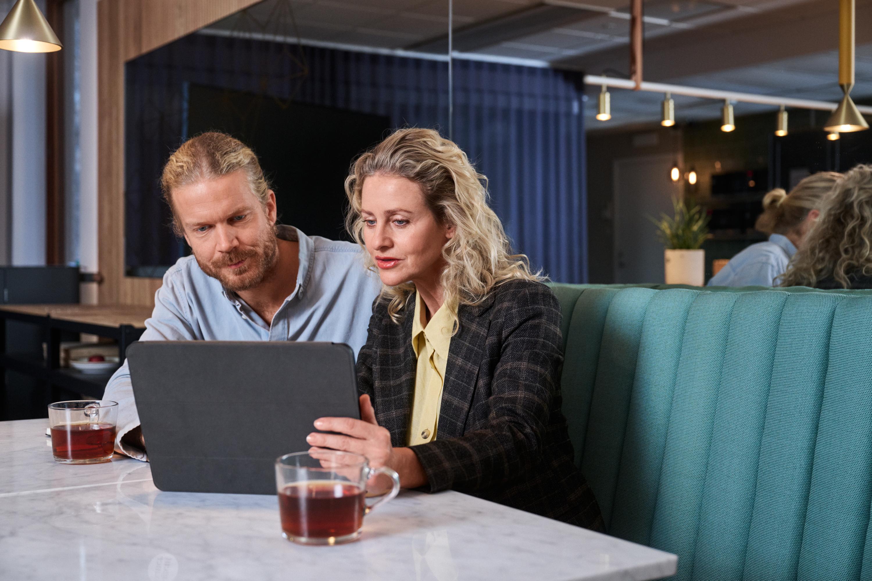 Two people having a business meeting together